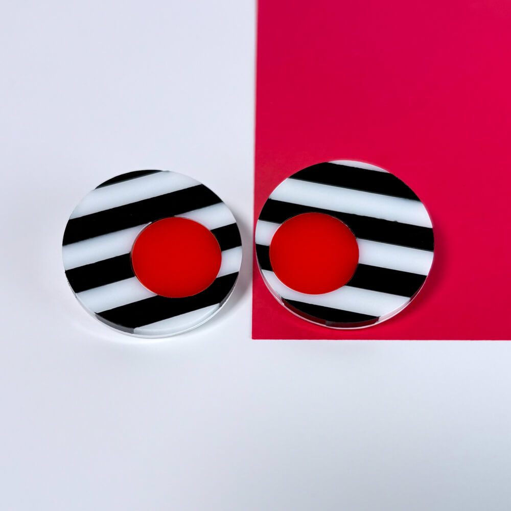 Optica Tondo – Orecchini in Plexiglas a righe